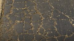 Cracked Asphalt Driveway