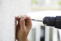 Power Drilling Screw into Wall